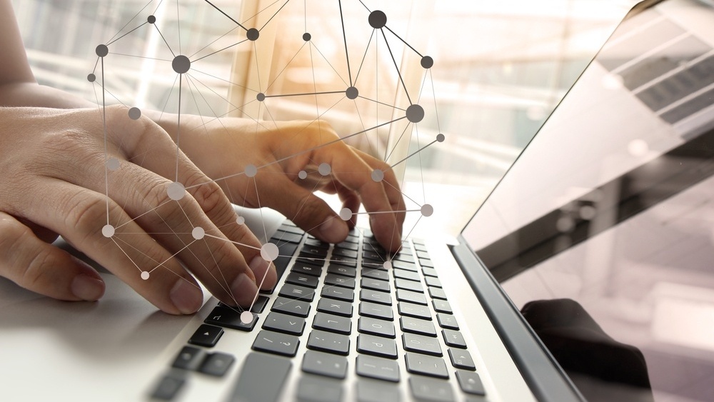 Double exposure of business man hand working on blank screen laptop computer on wooden desk as concept with social media diagram  -854591-edited