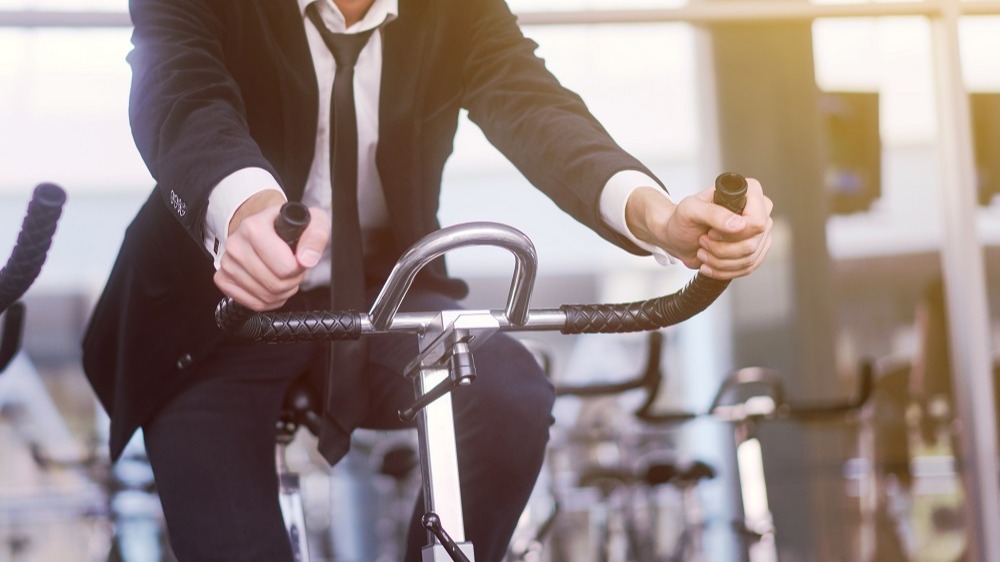 WEB - Businessman on a bike