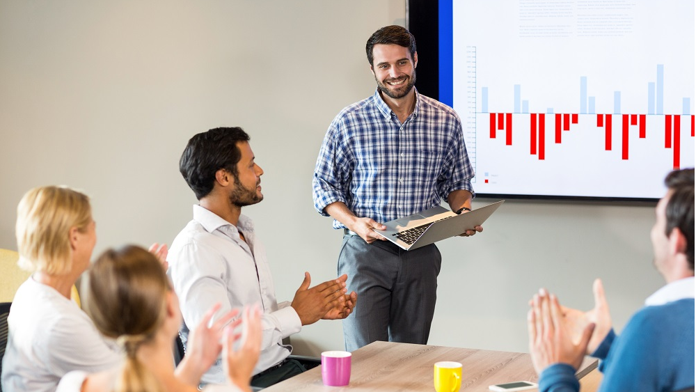 WEB Colleagues applauding a presentation