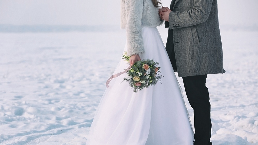 WEB - Winter Wedding Couple Snow Flowers.jpeg-621285-edited