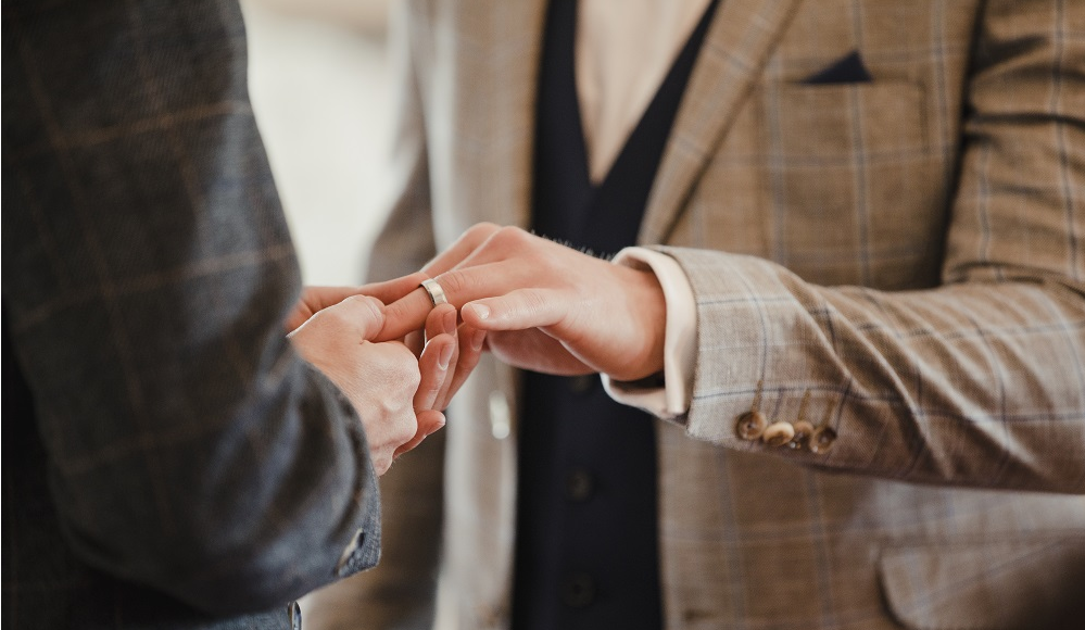 WEB Gay couple exchange rings